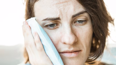 Patient suffering from TMJ pain